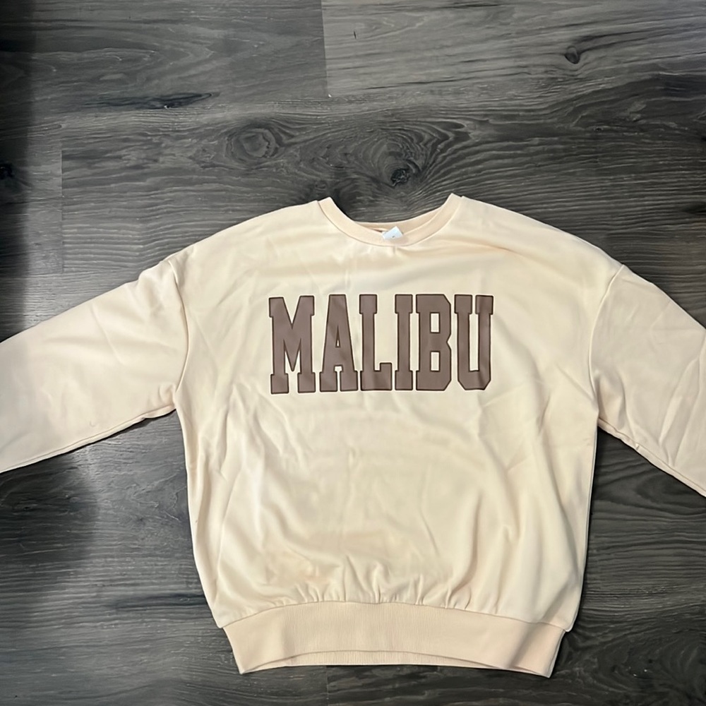Brand new cream kids sweatshirt.